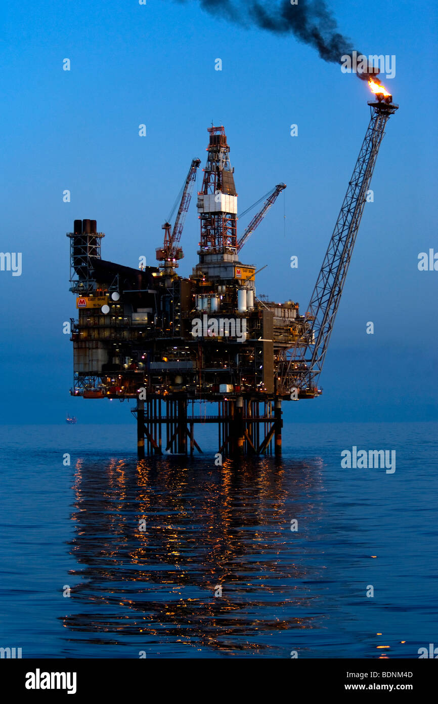 sun set at east brae oil rig Stock Photo