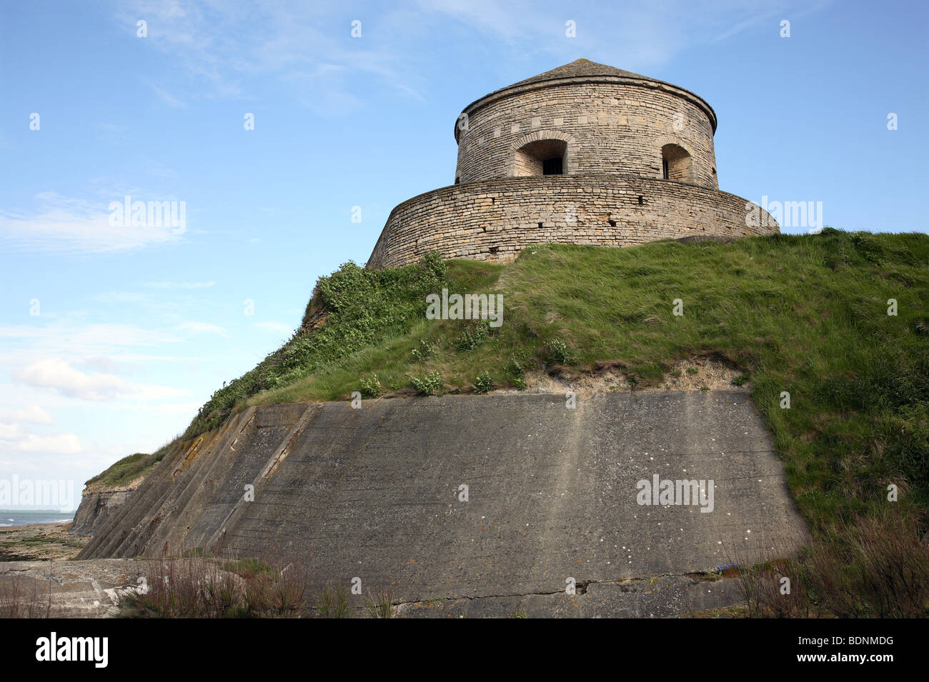 The artillery tower Tour Vauban at the Port-en-Bessin harbour, built 1694, also used by the Germans as an observatory post during World War 2. Huppain Stock Photo