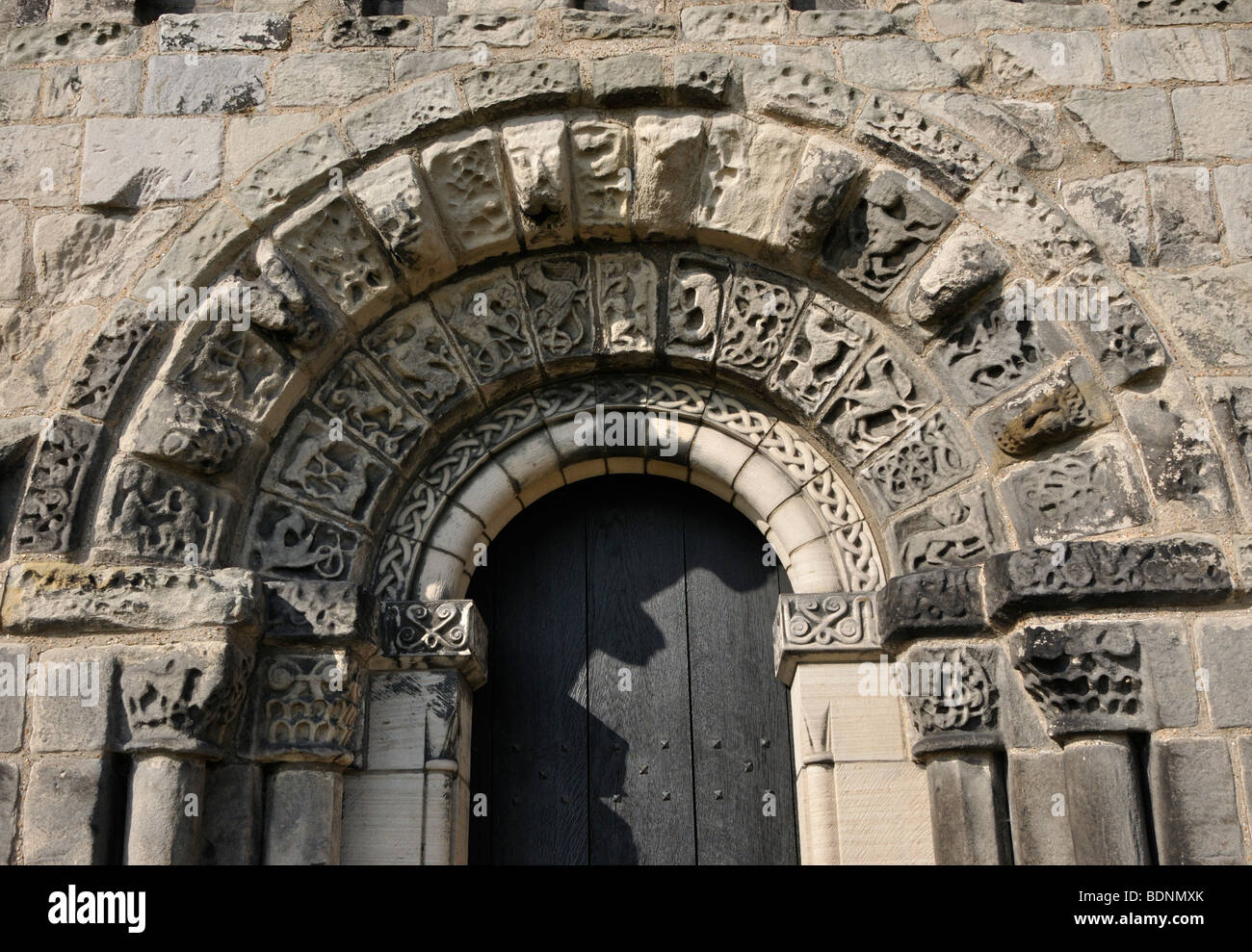 Norman doorway at St Cuthbert's Parish Church, Dalmeny, Scotland, UK. Stock Photo