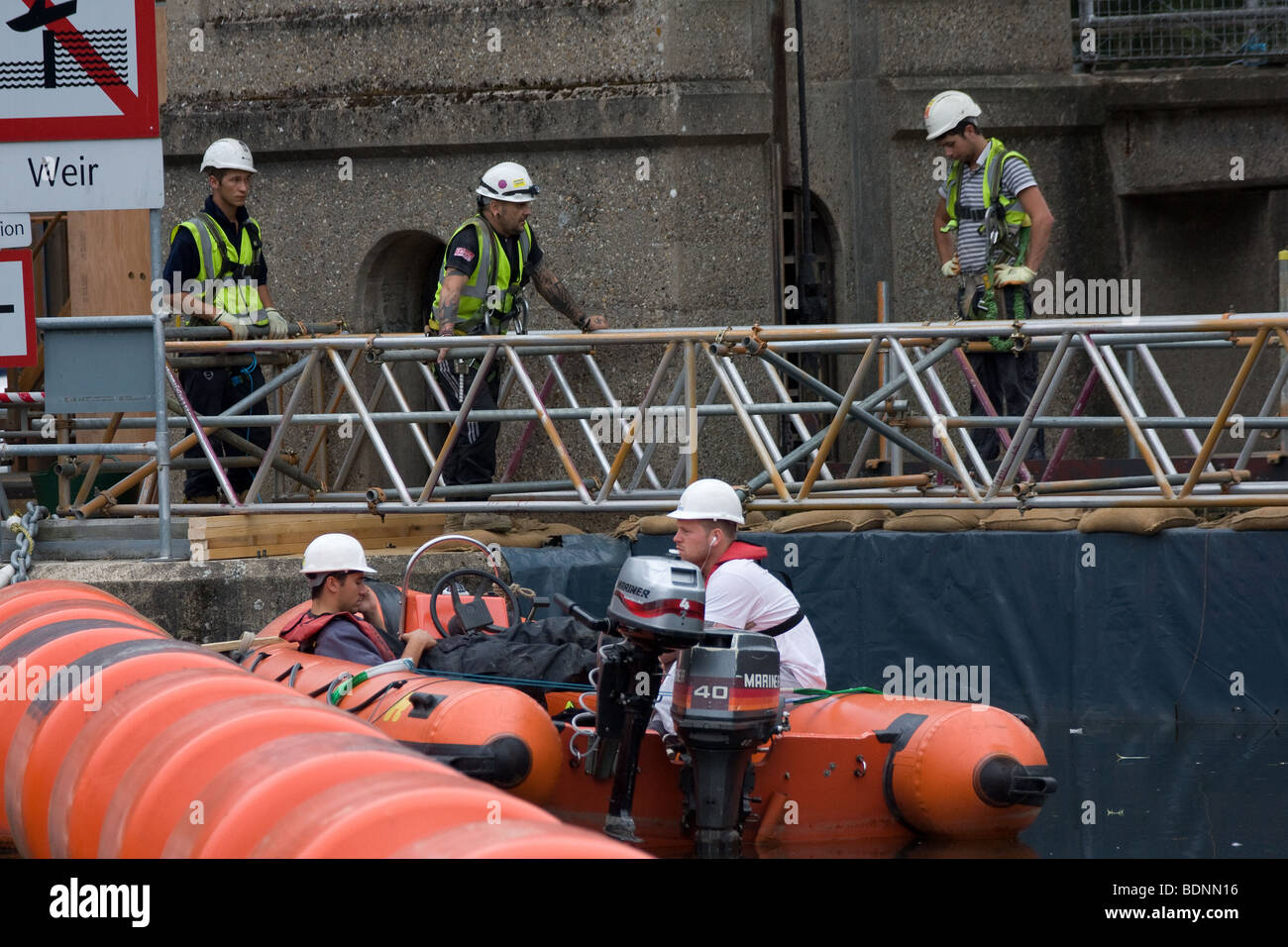 building scaffold scaffolding site construction rig workers Stock Photo