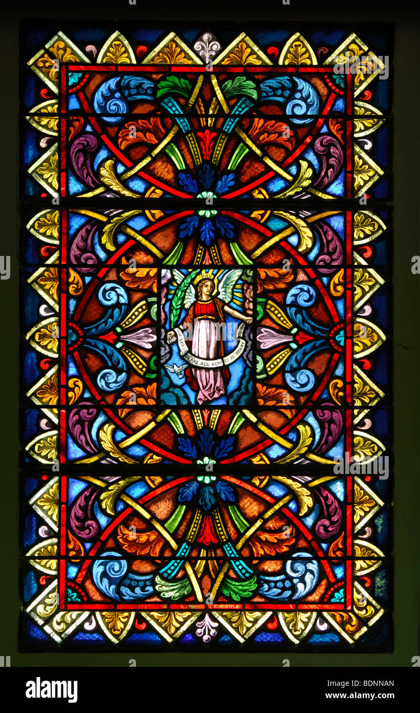 Church window, stained-glass window of the Saint-Théodule parish church in Vers-l'Eglise, Ormonts-Dessus, Vaud, Switzerland, Eu Stock Photo
