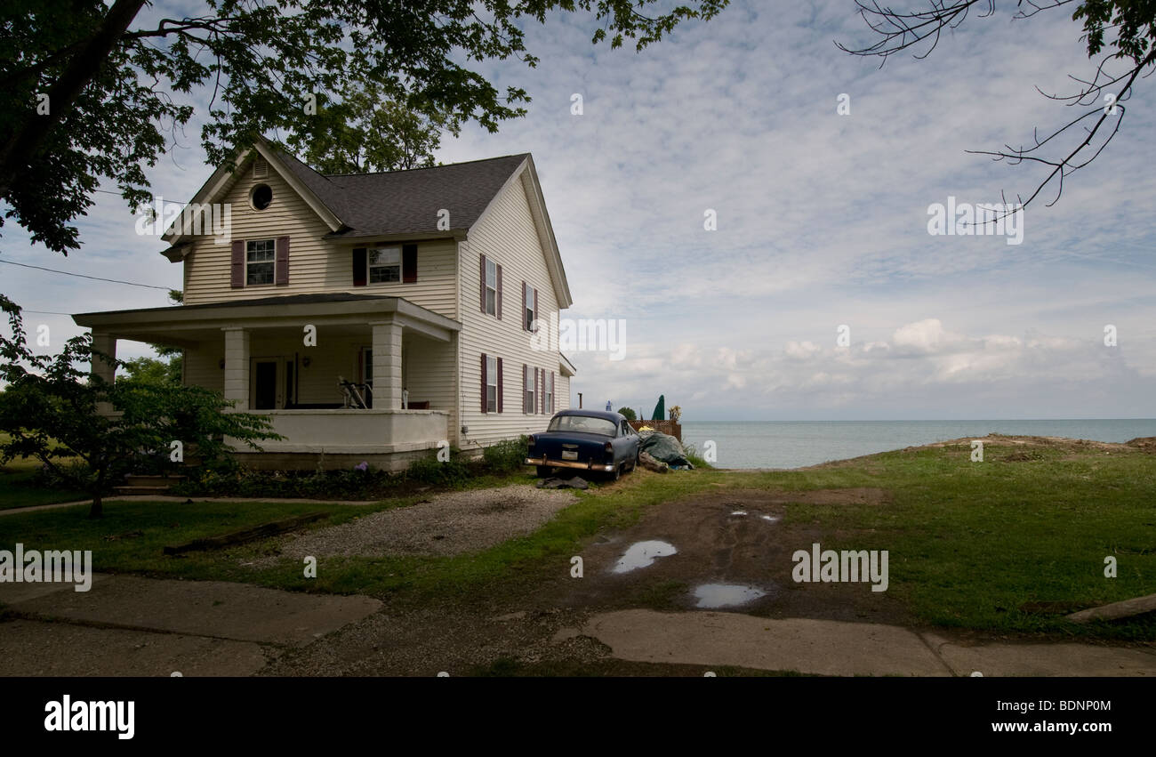Fifties Chevrolet besides house at lake Erie, US Stock Photo