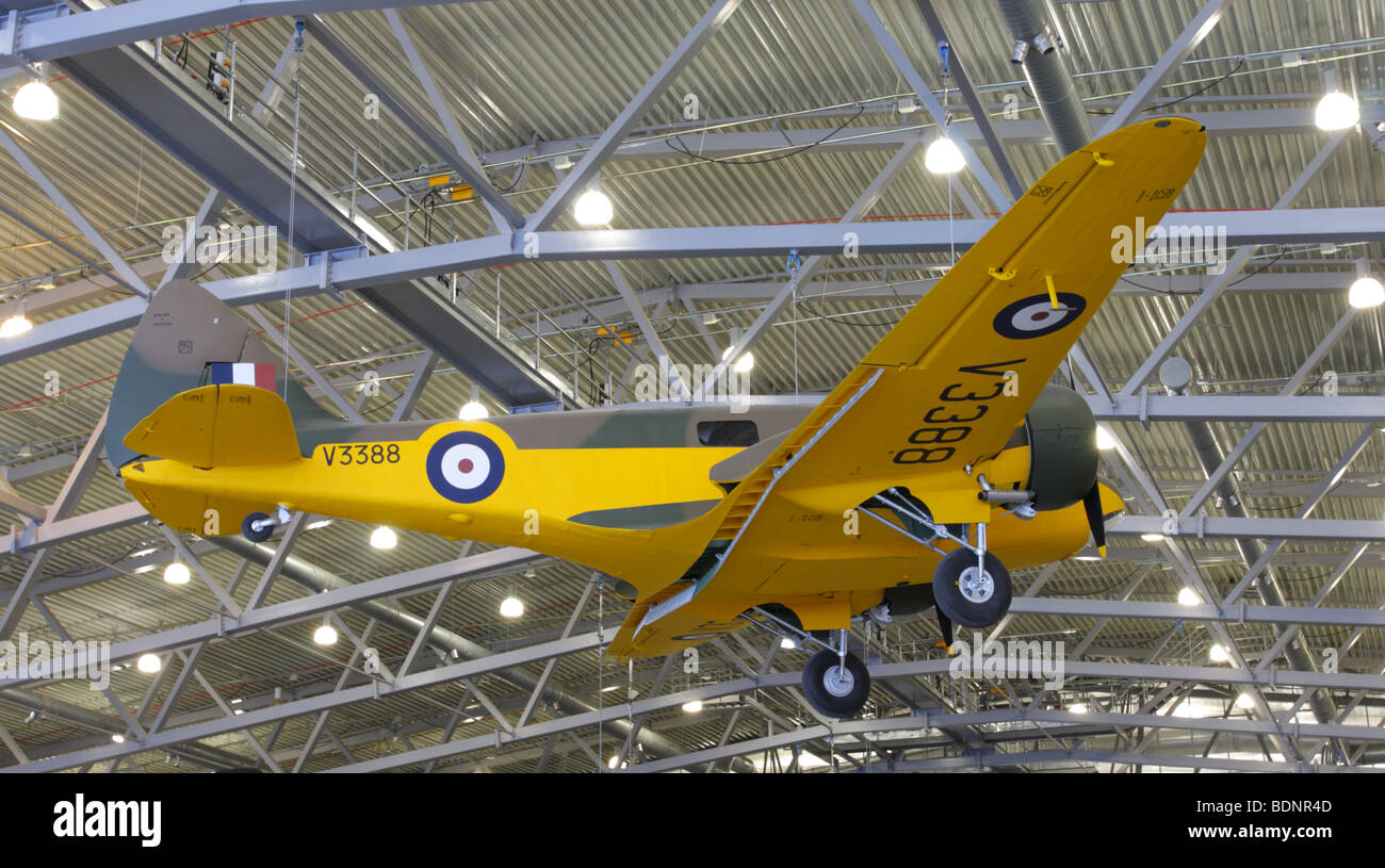 In yellow and camouflage livery is this Airspeed AS40 Oxford Mk1 aircraft, currently on permanent display at IWM Duxford, England. Stock Photo
