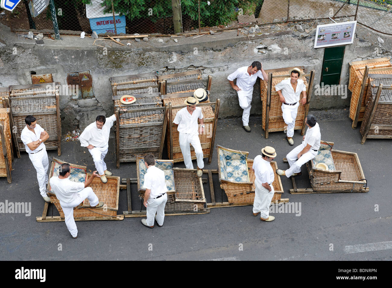Basket sleighs, drivers waiting for customers in Monte district, in Funchal, Madeira, Portugal, Europe Stock Photo