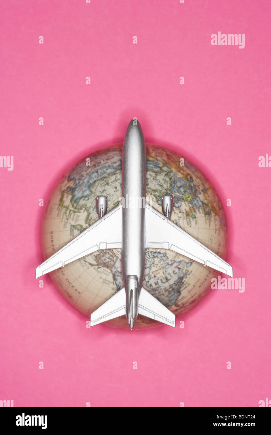 Globe and plane hi-res stock photography and images - Alamy