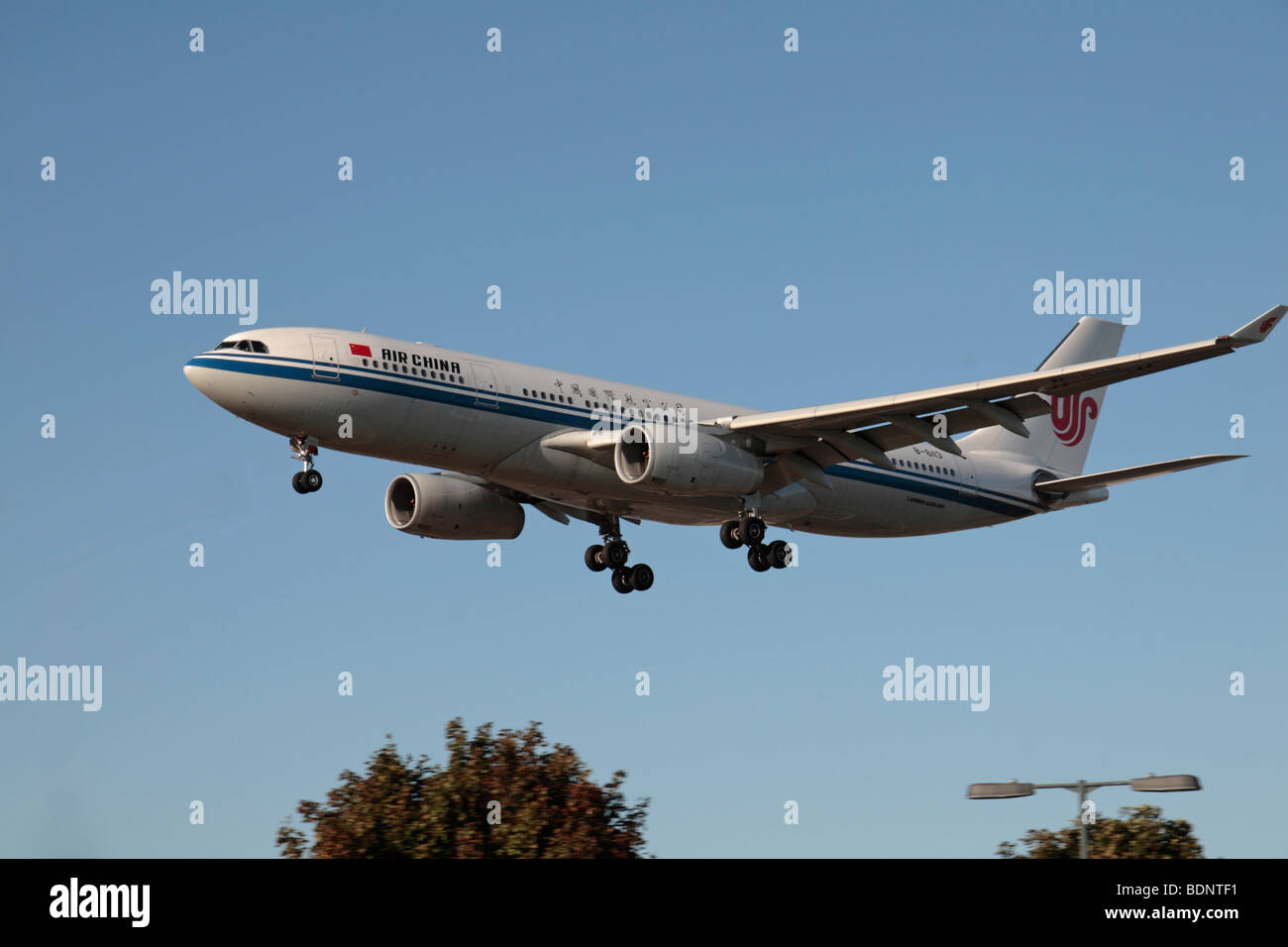 An Air China Airbus A330 plane landing at Heathrow Airport, London,  UK. (B-6113) Stock Photo