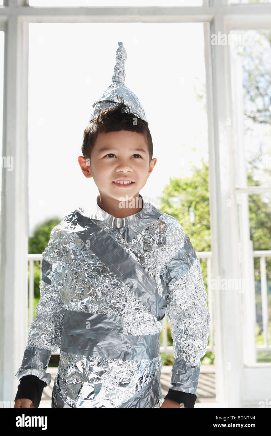 Portrait of young boy (56) wearing aluminum foil knight costume