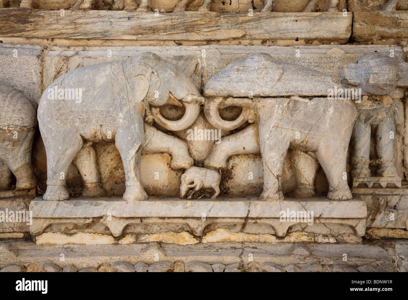 Carved elephants on the exterior wall of Jagdish Temple, Udaipur, India Stock Photo