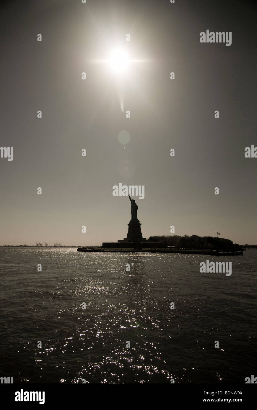 The Statue of Liberty seen from the water in New York Harbor, USA Stock