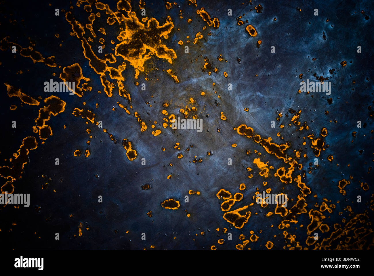 A rust pattern on a blue background Stock Photo - Alamy