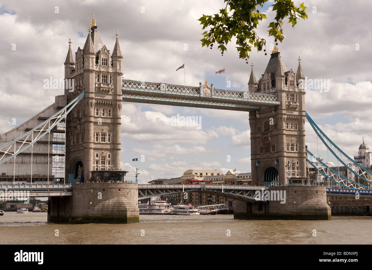 Famous landmark Tower Bridge crossing the Thames river in London, UK Stock Photo