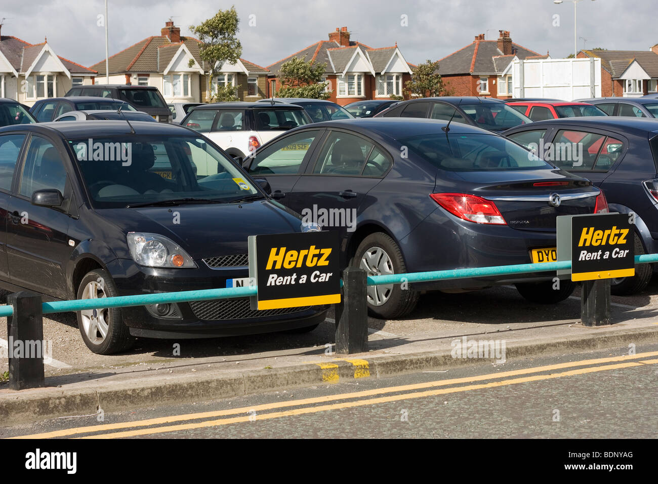 Parked Rental cars of Hertz Rent a car Stock Photo