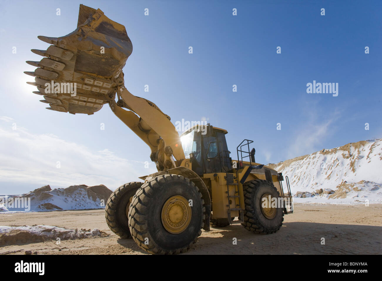 Low angle view of a front-end loader at a construction site Stock Photo