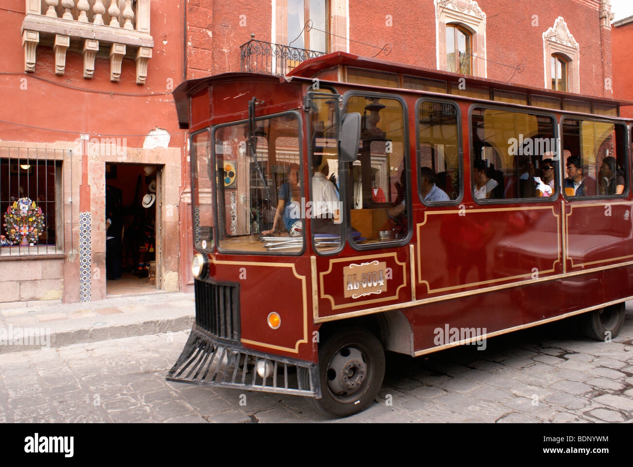 Sightseeing trolley bus on a street in San Miguel de Allende, Guanajuato, Mexico Stock Photo