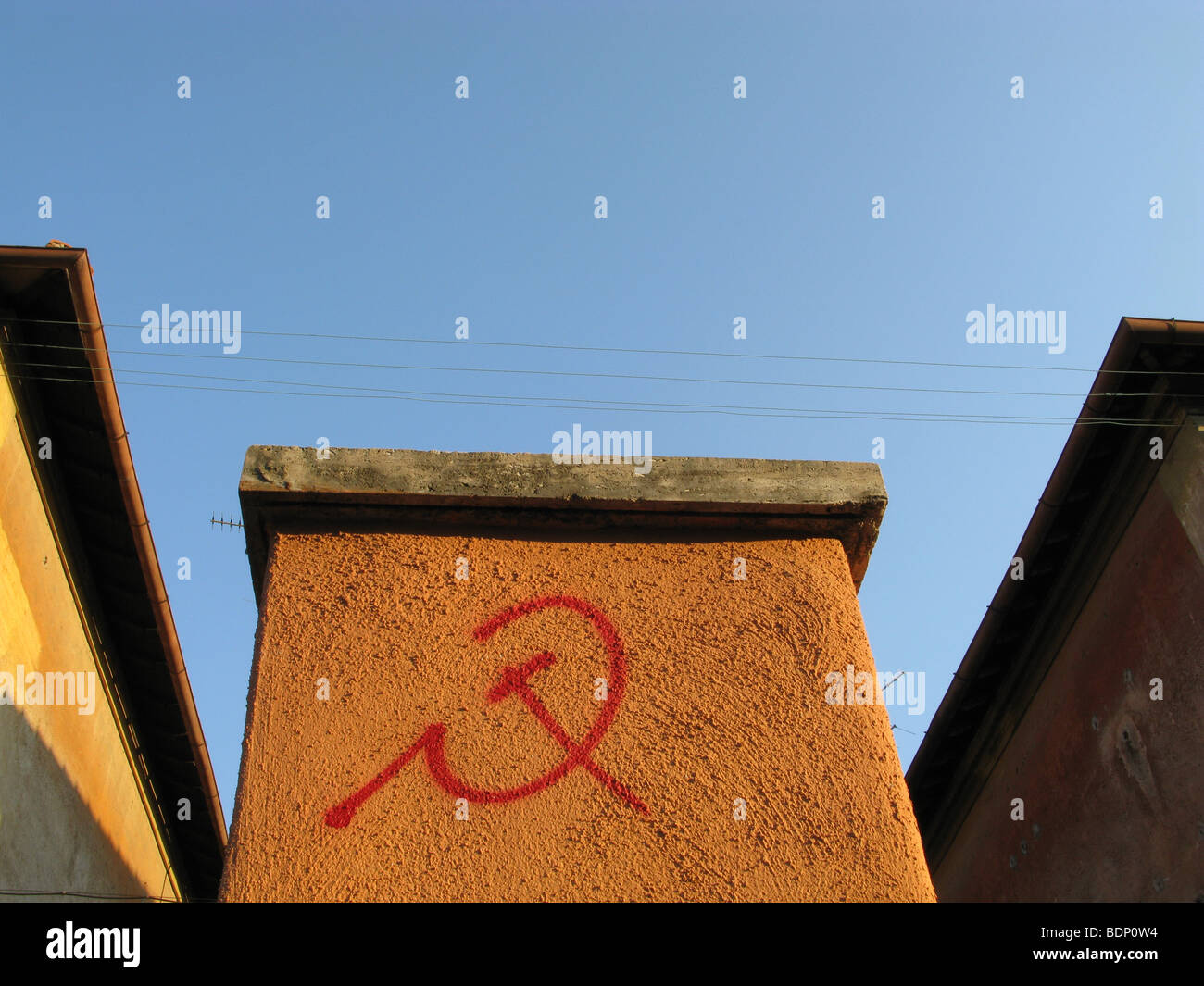 communist symbol written on wall in garbatella, rome Stock Photo - Alamy