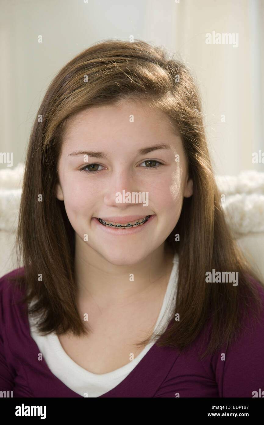 Portrait of a teenage girl smiling Stock Photo - Alamy