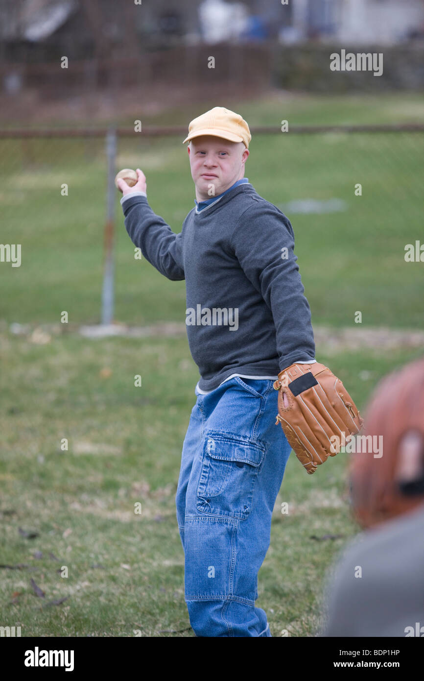 Man playing baseball Stock Photo - Alamy