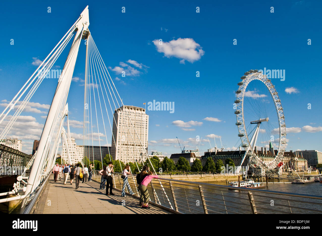 London Eye & the River Thames from Millennium Bridge, London, England, UK Stock Photo