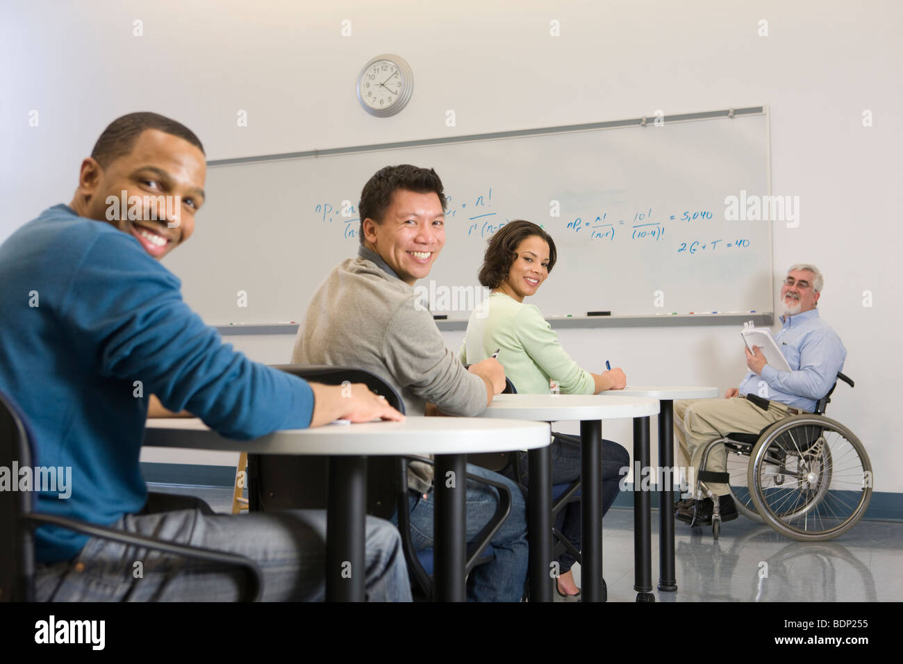 University professor and students in a classroom Stock Photo