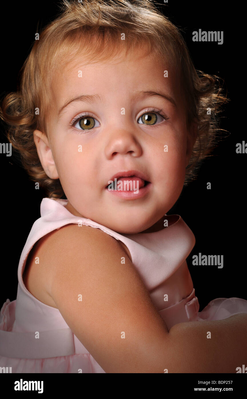 Portrait of young girl over a white background Stock Photo - Alamy