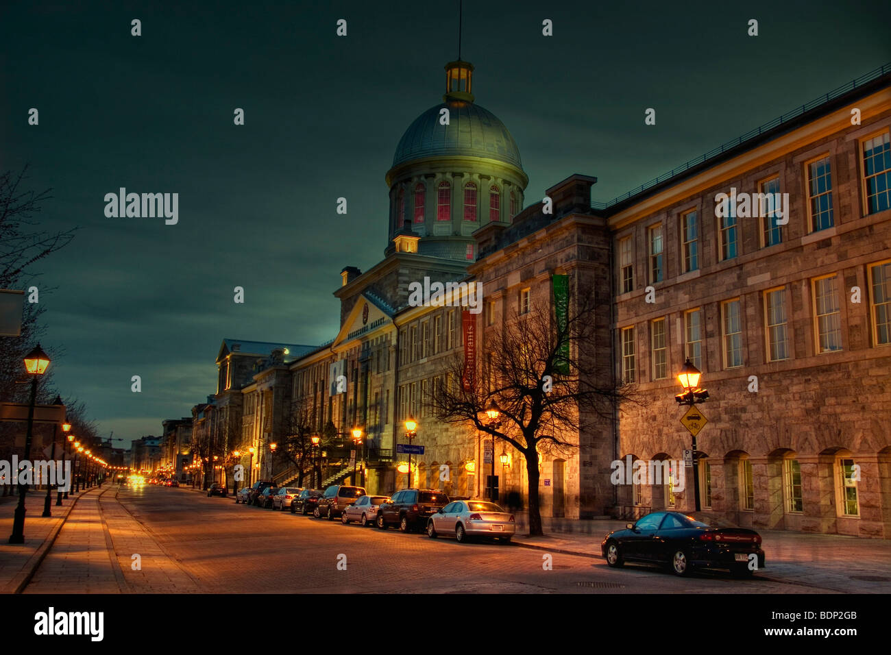 City buildings with street lights at night Stock Photo - Alamy