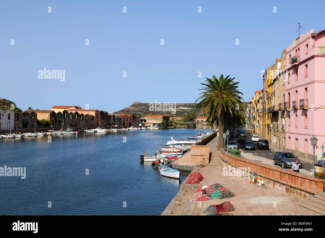 Boats on the river Temo and the historic town centre of Bosa, Oristano, Sardinia, Italy, Europe Stock Photo