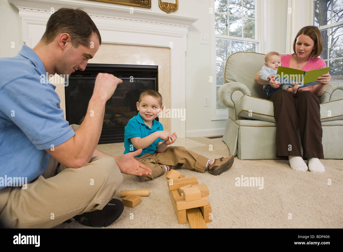 Family communicating in American Sign Language Stock Photo