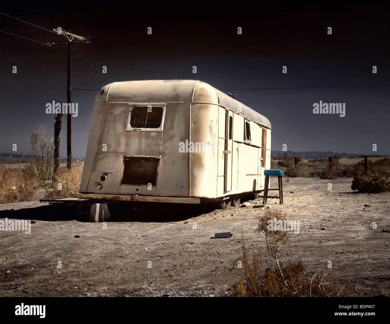 An old white caravan left to rot in the desert Stock Photo Alamy