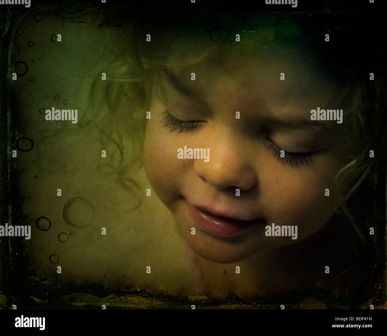 A young girl with her eyes closed Stock Photo - Alamy