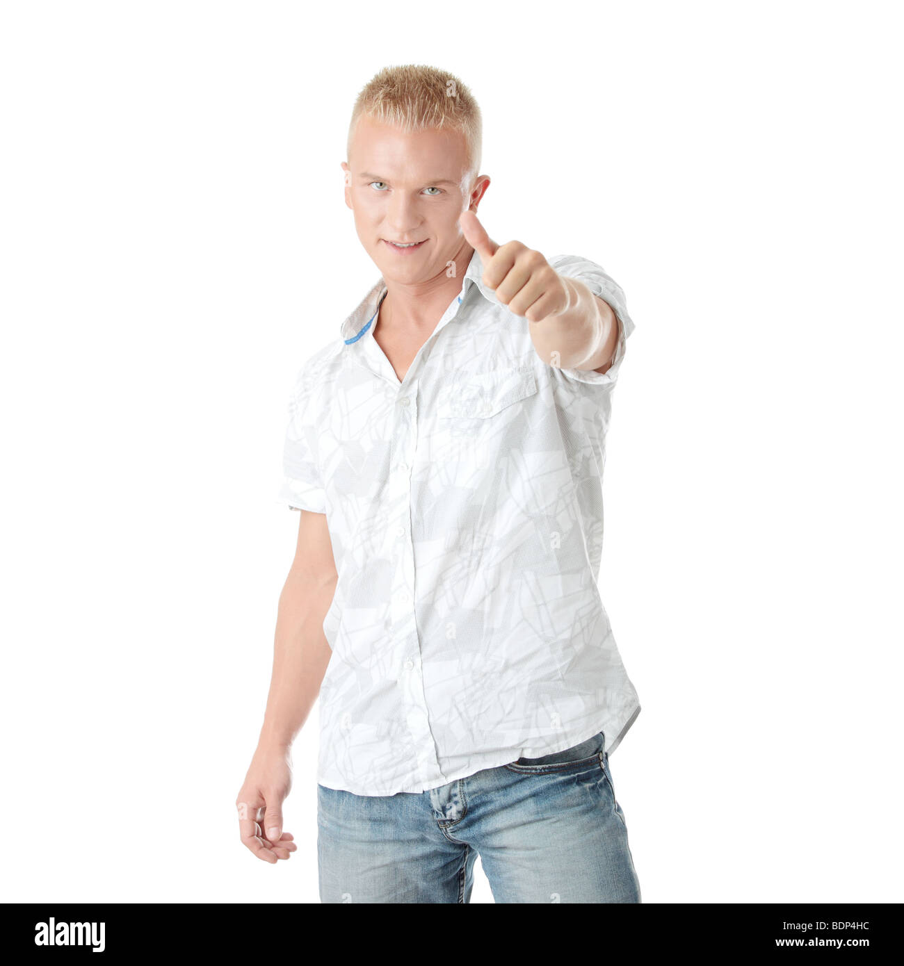 Young casual man portrait doing the thumbs up sign in a white ...