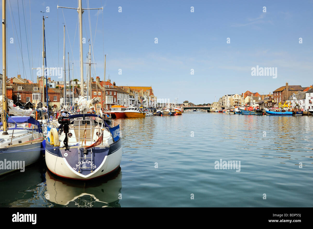 Sailboats docked in the old port of Weymouth, Dorset, England, UK, Europe Stock Photo