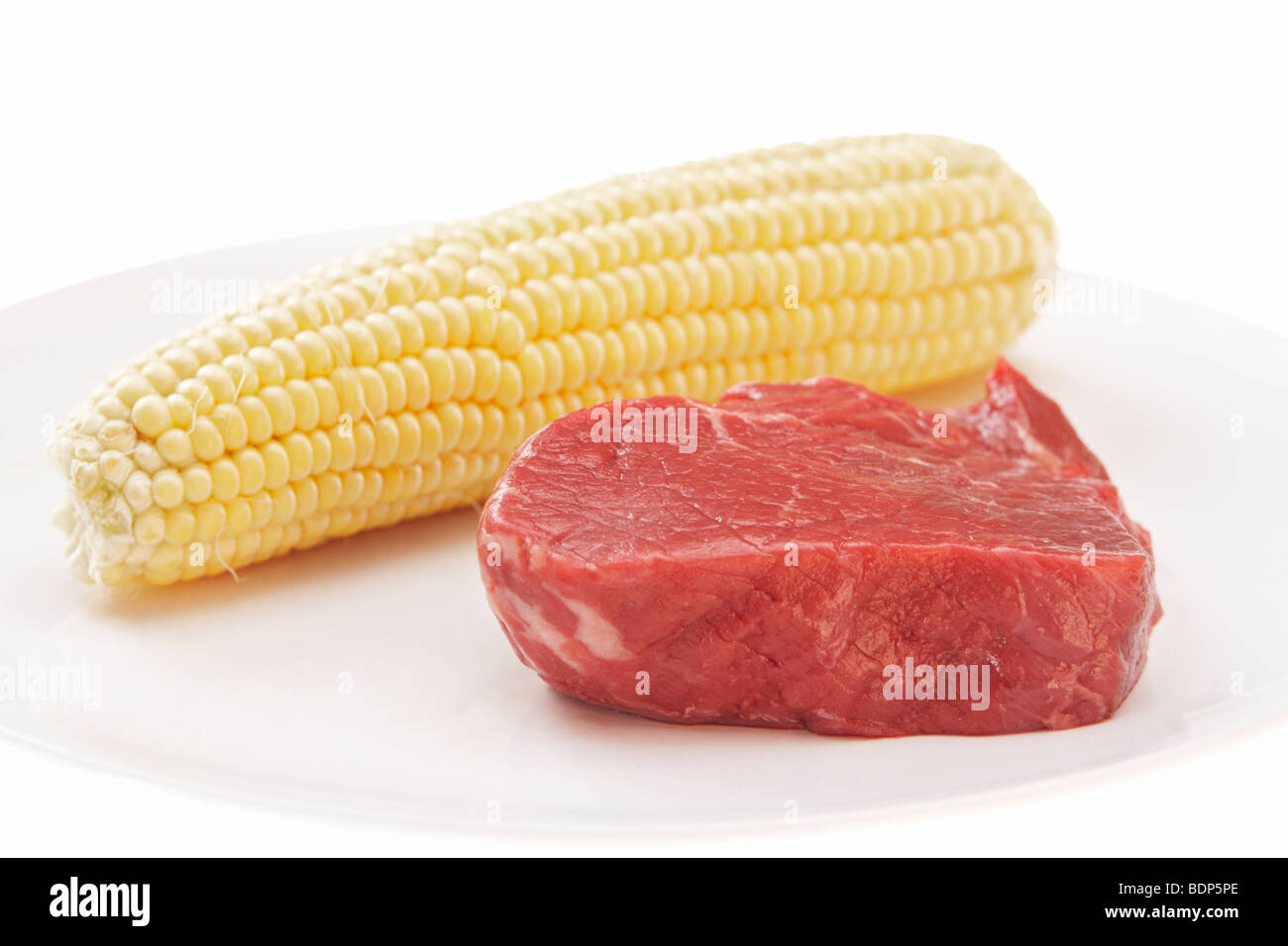 Raw beef and corn Stock Photo