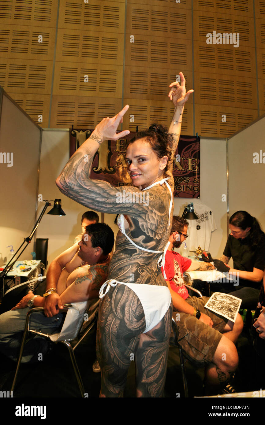 A woman displays her full body tattoos, Tattoo Convention, Capetown, South Africa Stock Photo