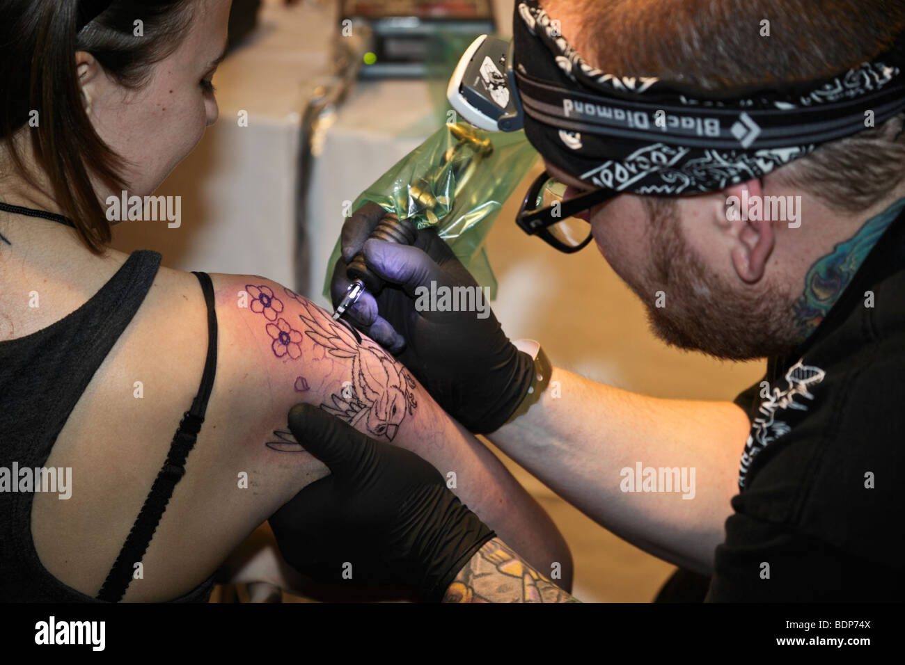 Painted arm tattoos hi-res stock photography and images - Alamy