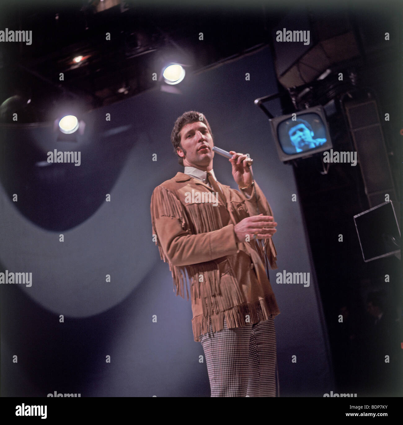 TOM JONES  Welsh pop singer singing The Green, Green Grass of Homeon a TV show  in November 1966. Photo: Tony Gale Stock Photo