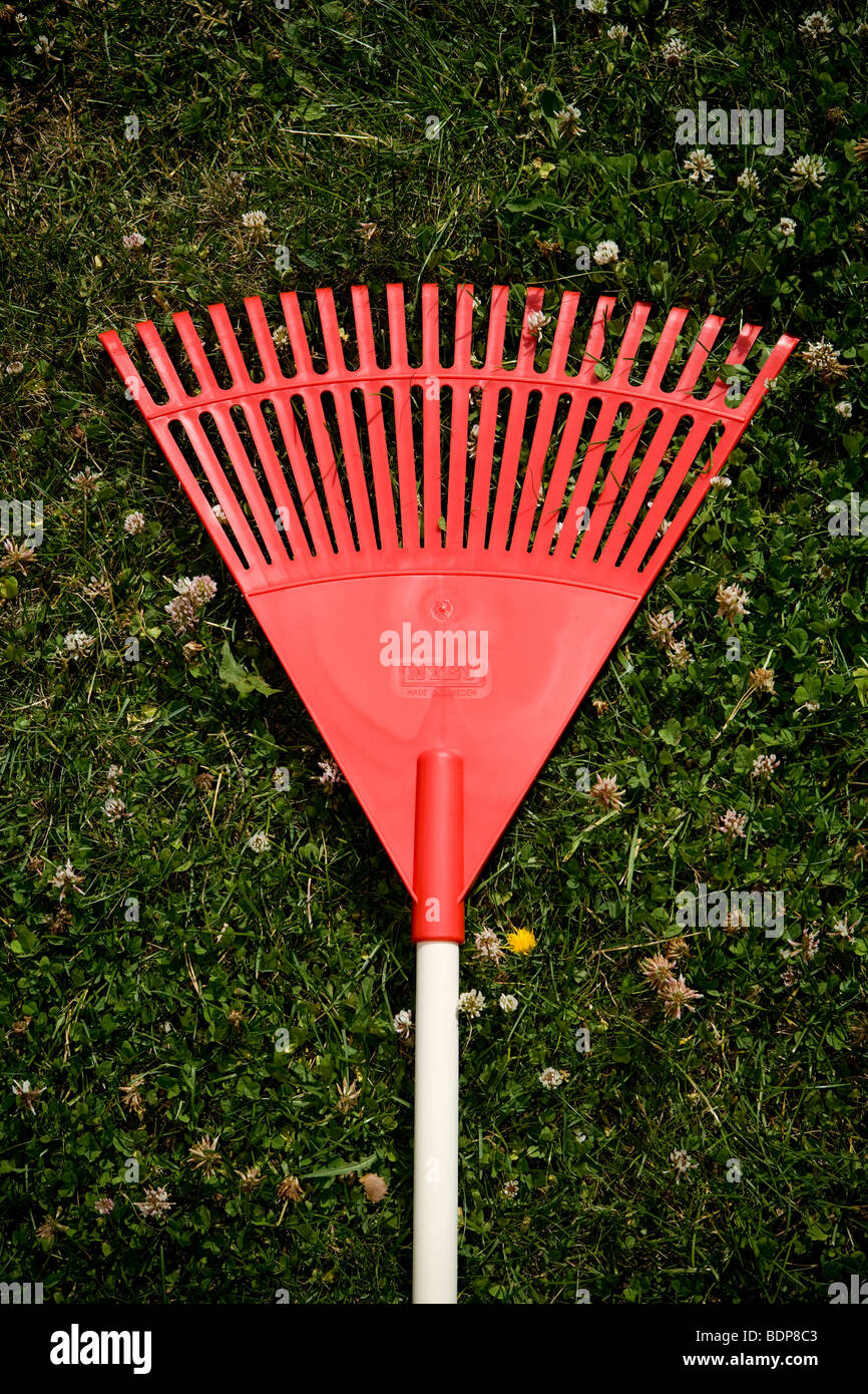 A rake on a lawn Sweden Stock Photo - Alamy