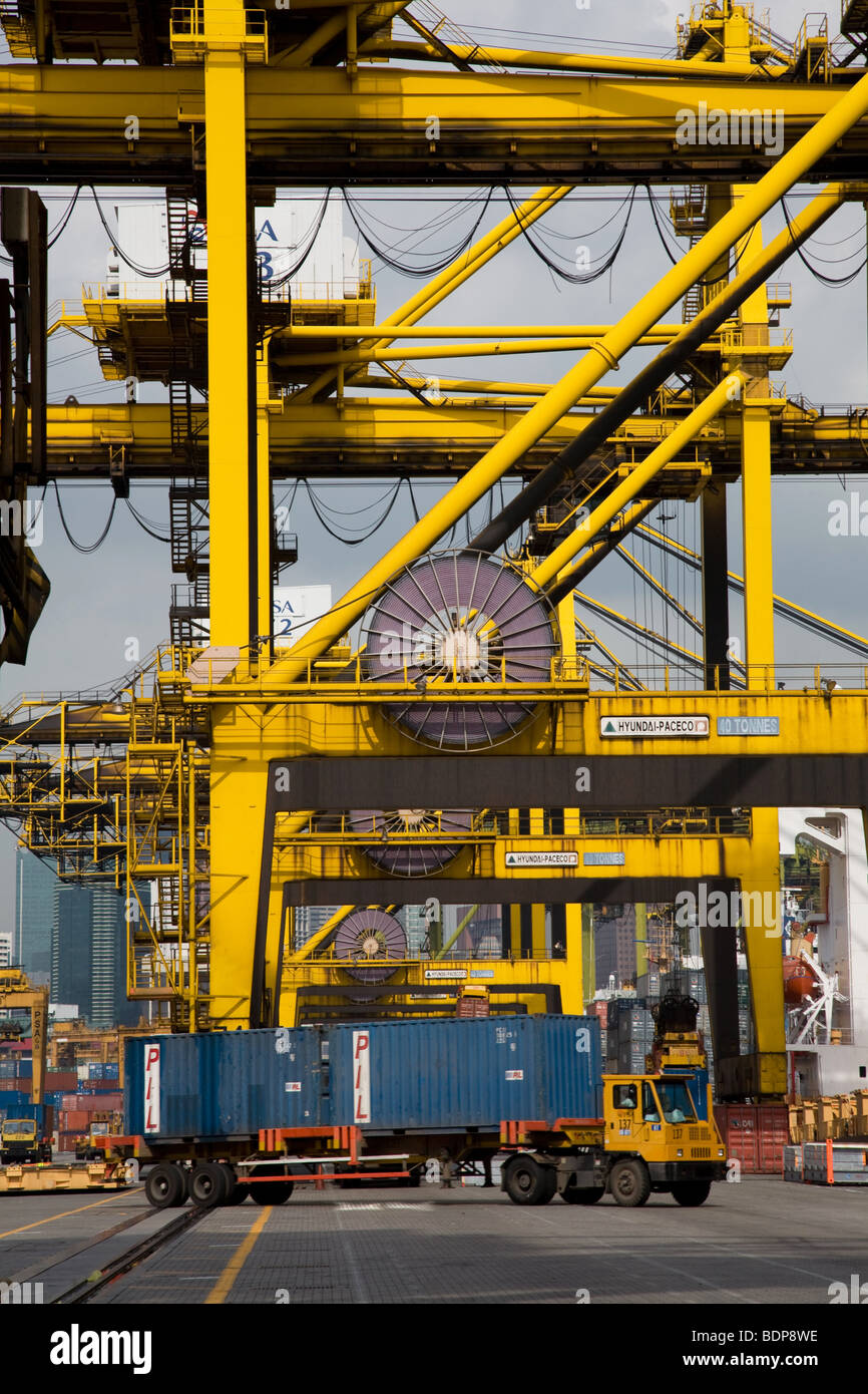 Container port cranes spool cable cabling truck Stock Photo Alamy