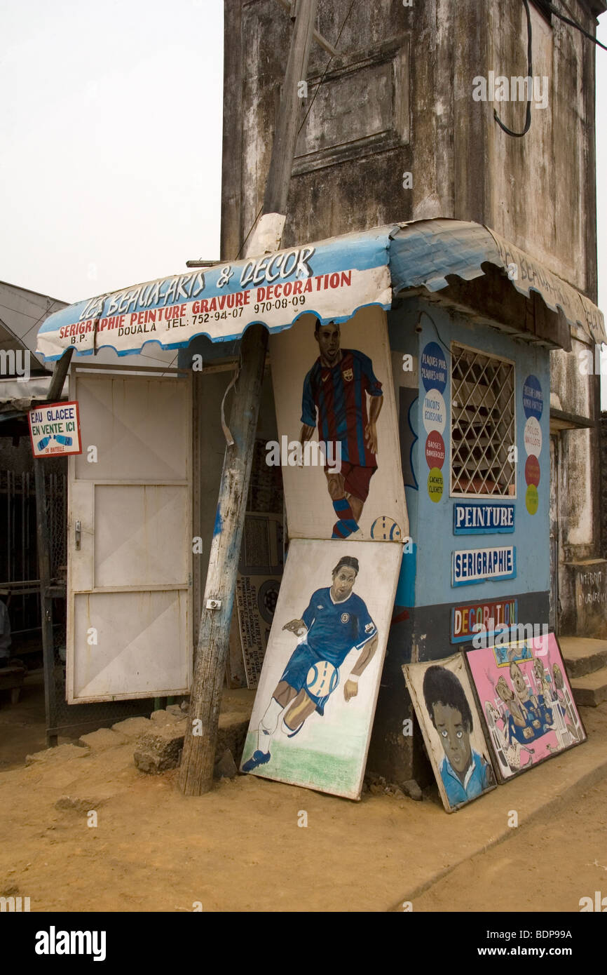 Paintings of footballers Samuel Etoo and Didier Drogba New-Bell neighbourhood Douala Cameroon West Africa Stock Photo