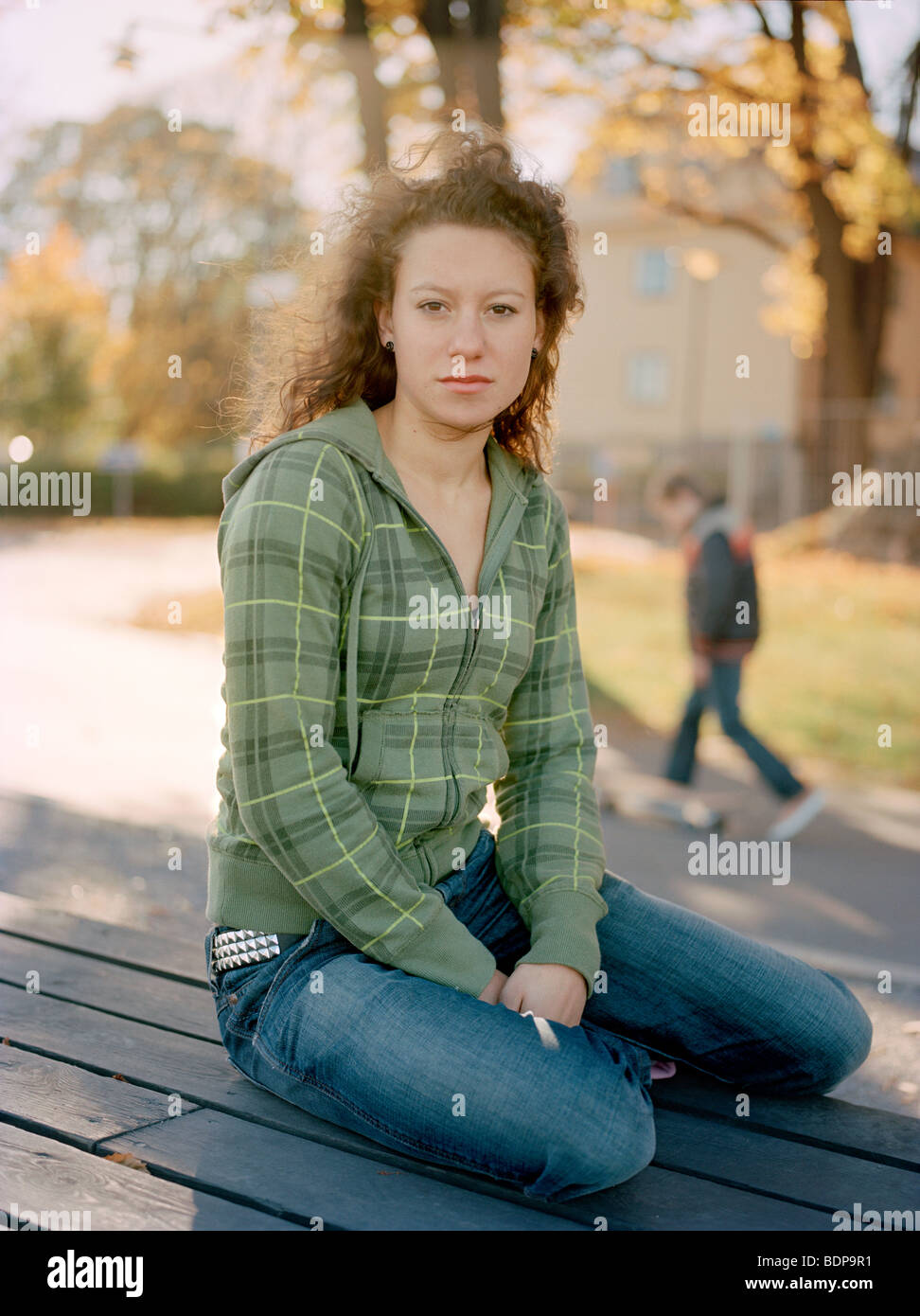 Portrait of a teenage girl in autumnal sun, Sweden. Stock Photo