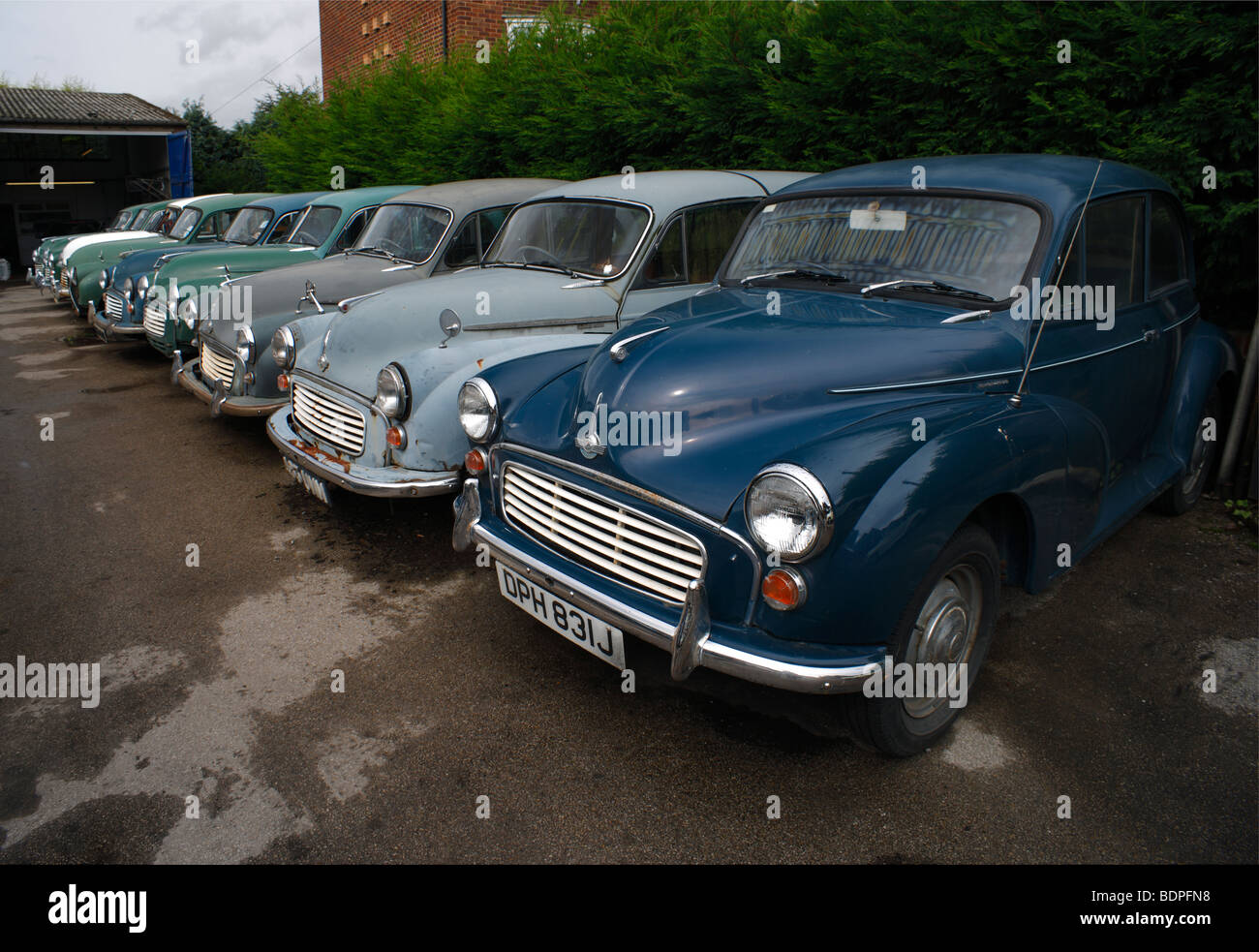 Row of old Morris Minor cars. King Street Motor Services, West Malling