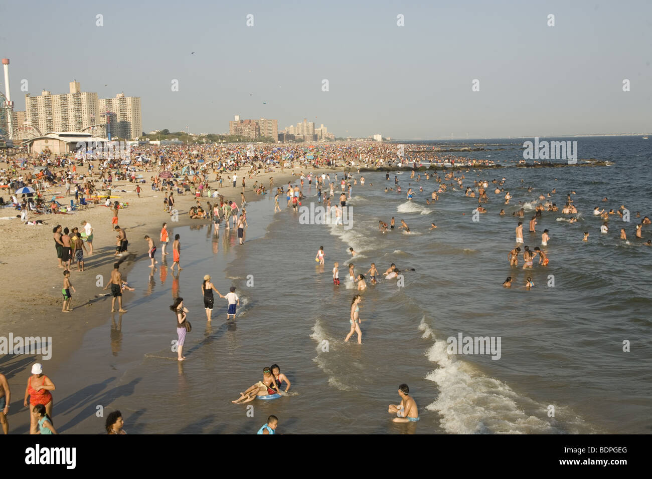 Warm summer day on the beach at Coney Island, Brooklyn, New York Stock ...