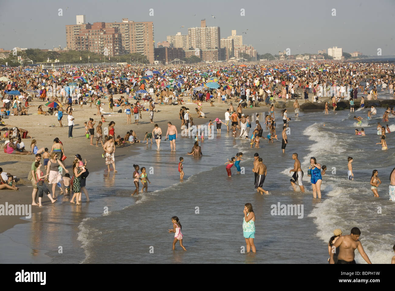 Warm summer day on the beach at Coney Island, Brooklyn, New York Stock ...