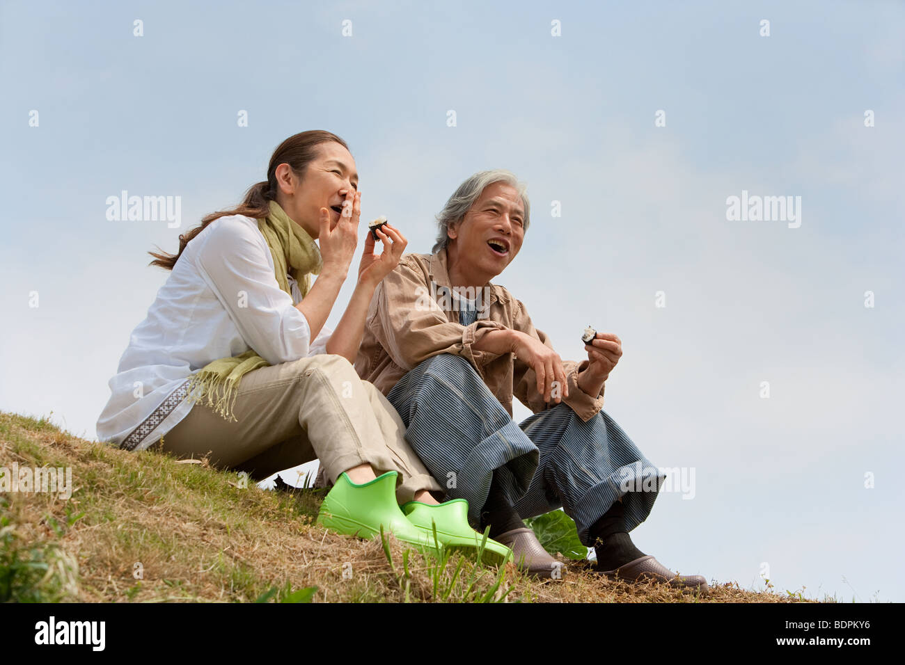 Senior man woman couple sitting hi-res stock photography and images - Alamy