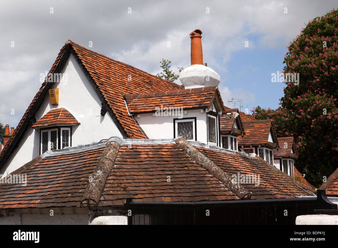 England, Berkshire, Bray Village, High Street, distinctive red rosemary tiled house roof Stock