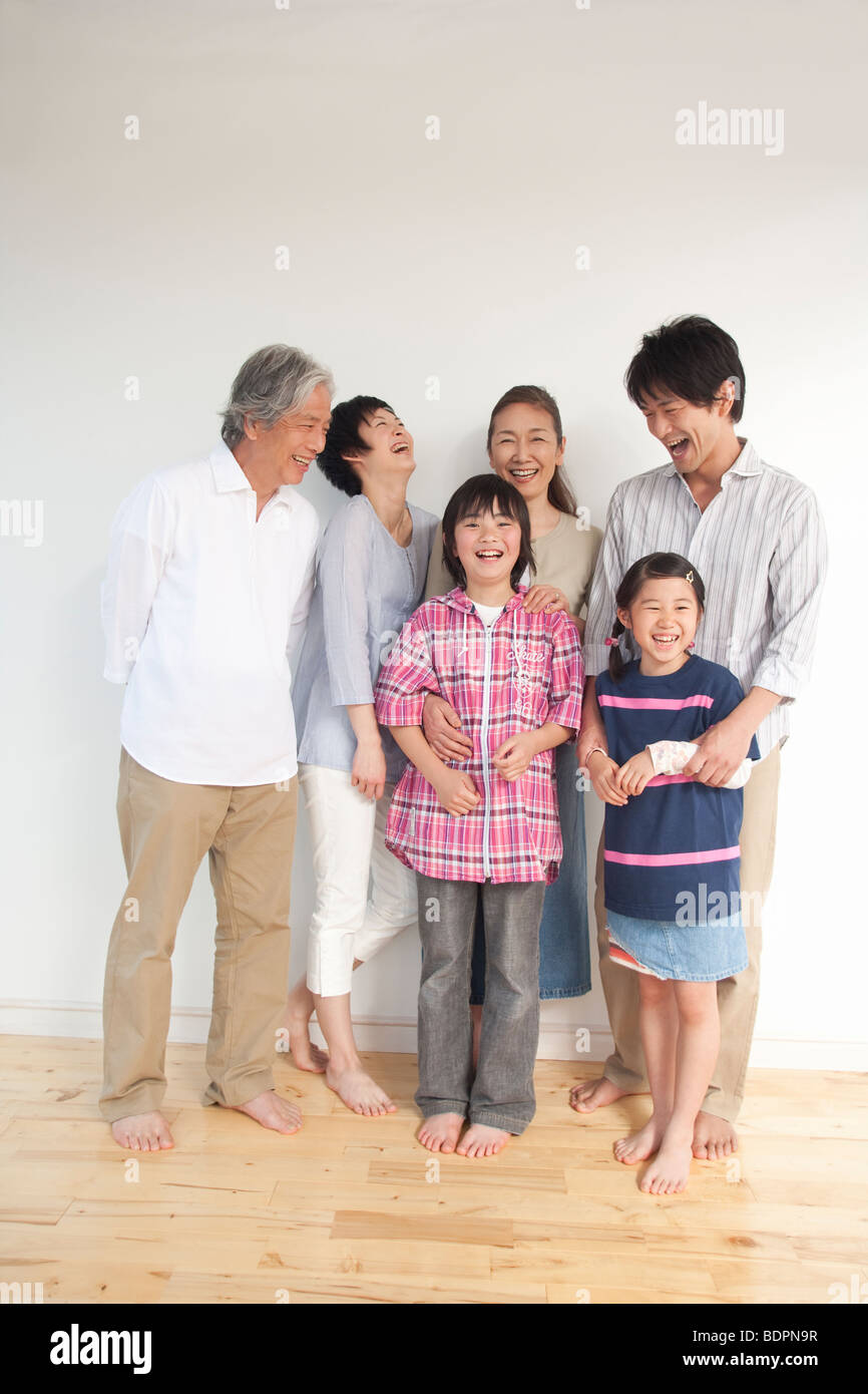Multi generation family smiling Stock Photo