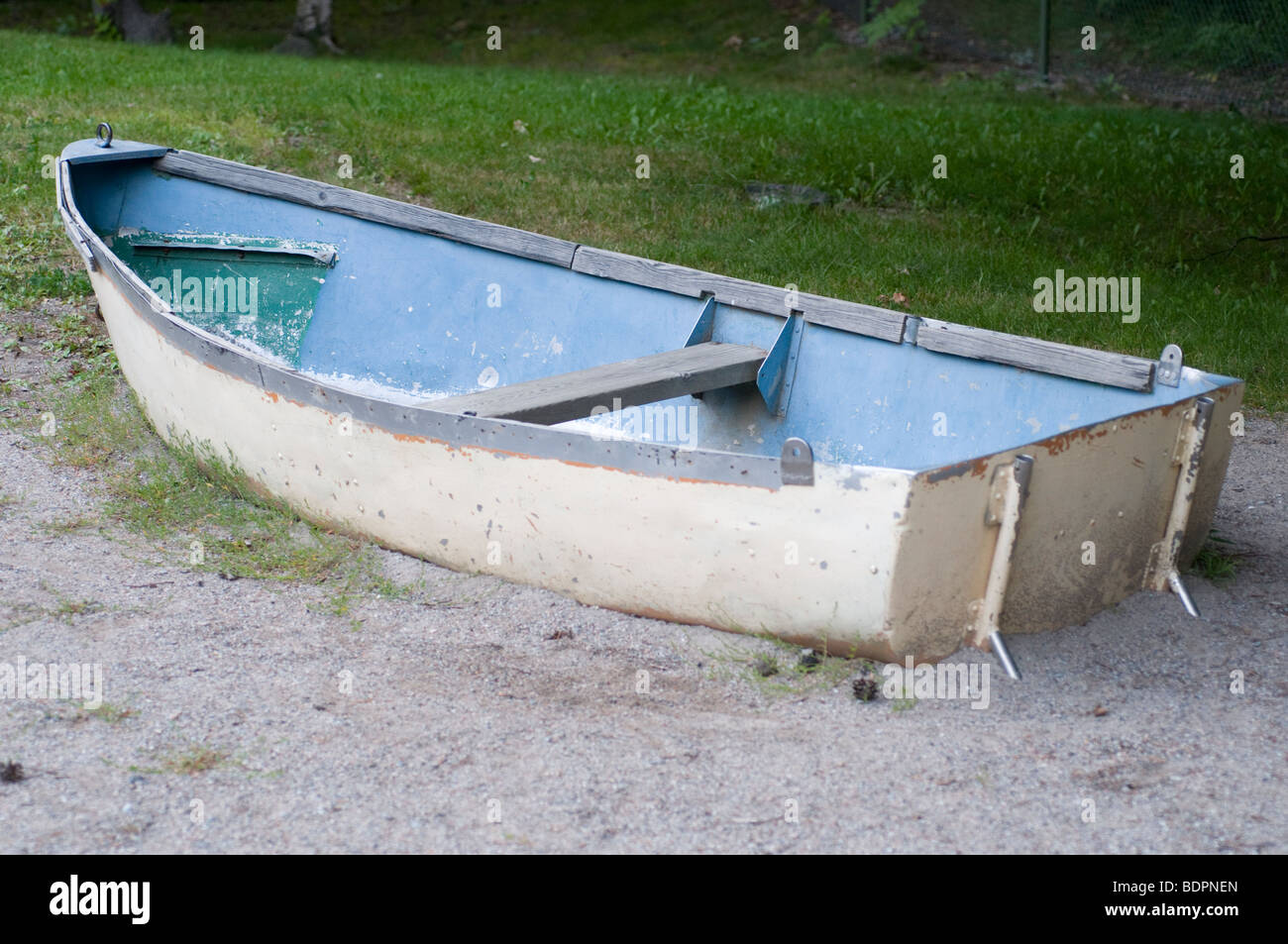Small rowing boat on the ground Stock Photo Alamy