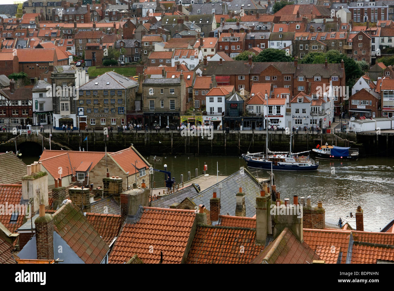 A view over rooftops to Whitby harbour Stock Photo - Alamy