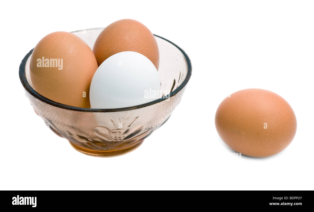 Eggs in glass bowl isolated on the white background Stock Photo Alamy