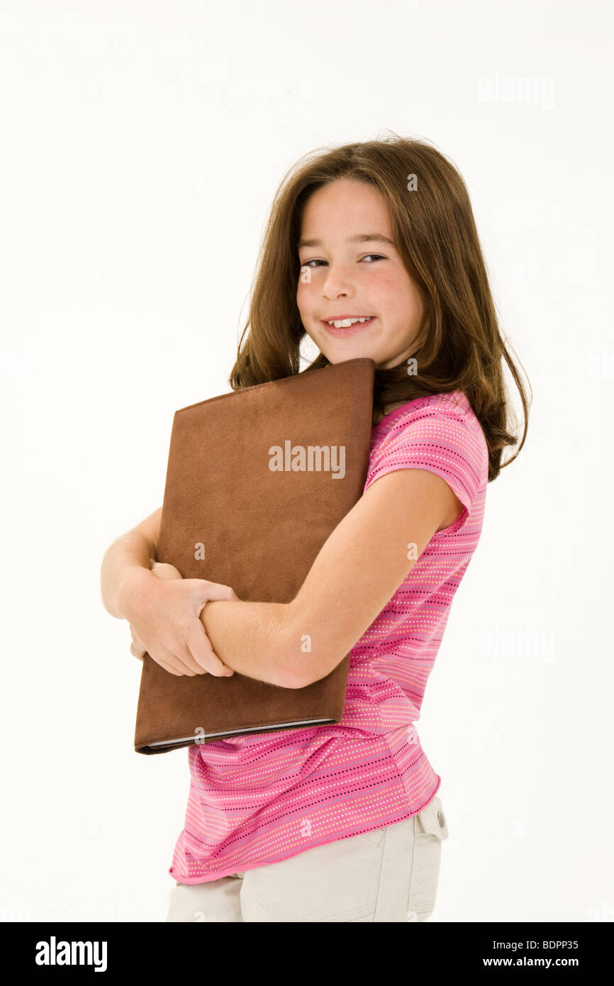 Child standing with school books on white background Stock Photo - Alamy