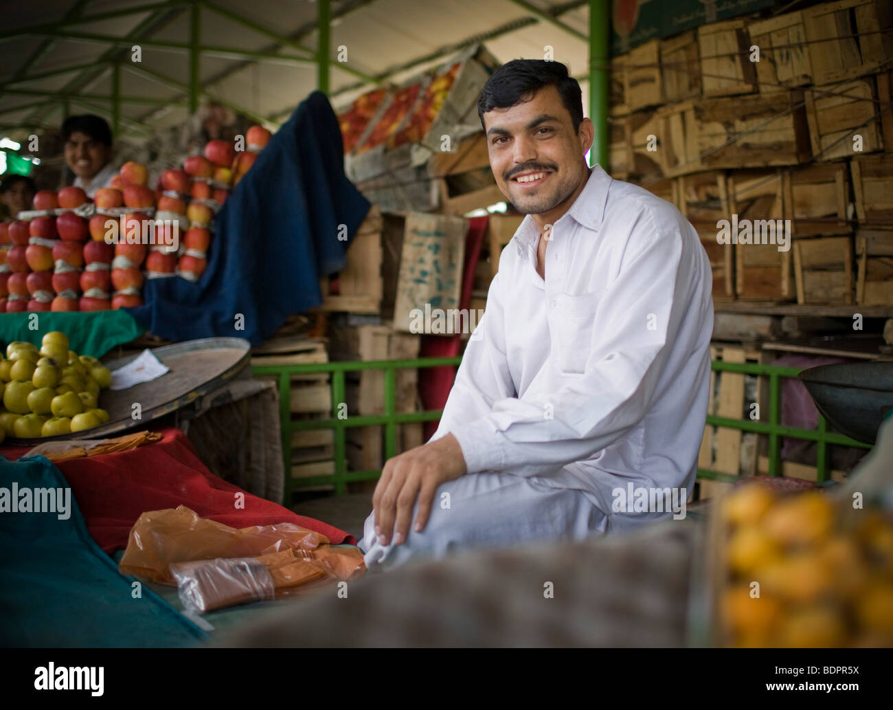 Man selling fruits at the Itwar Bazar in Islamabad , Stock Photo